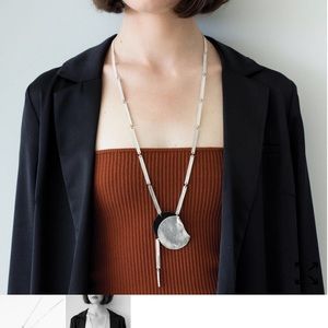 Anne-Marie Chagnon leather detail necklace.